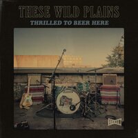 An Empty Glass - These Wild Plains