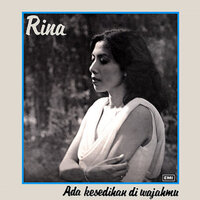 Ada Kesedihan Di Wajahmu - Rina Rahman