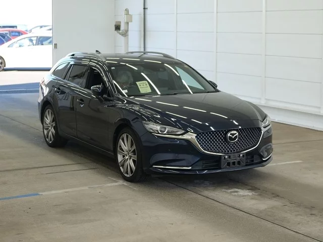 Mazda  III Рестайлинг
