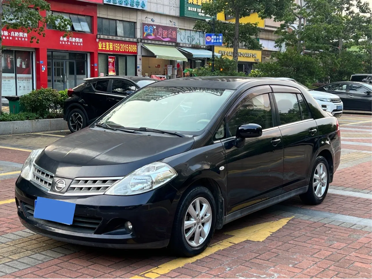 Nissan Tiida I Рестайлинг