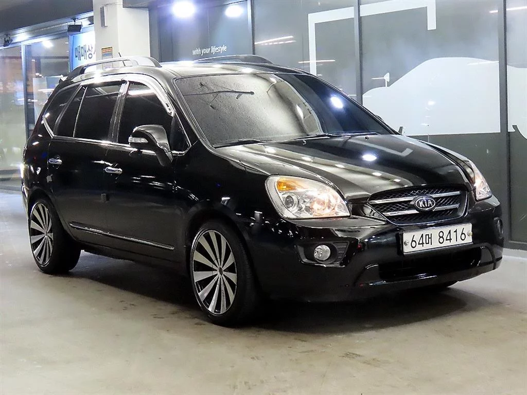 Kia Carens II (UN)