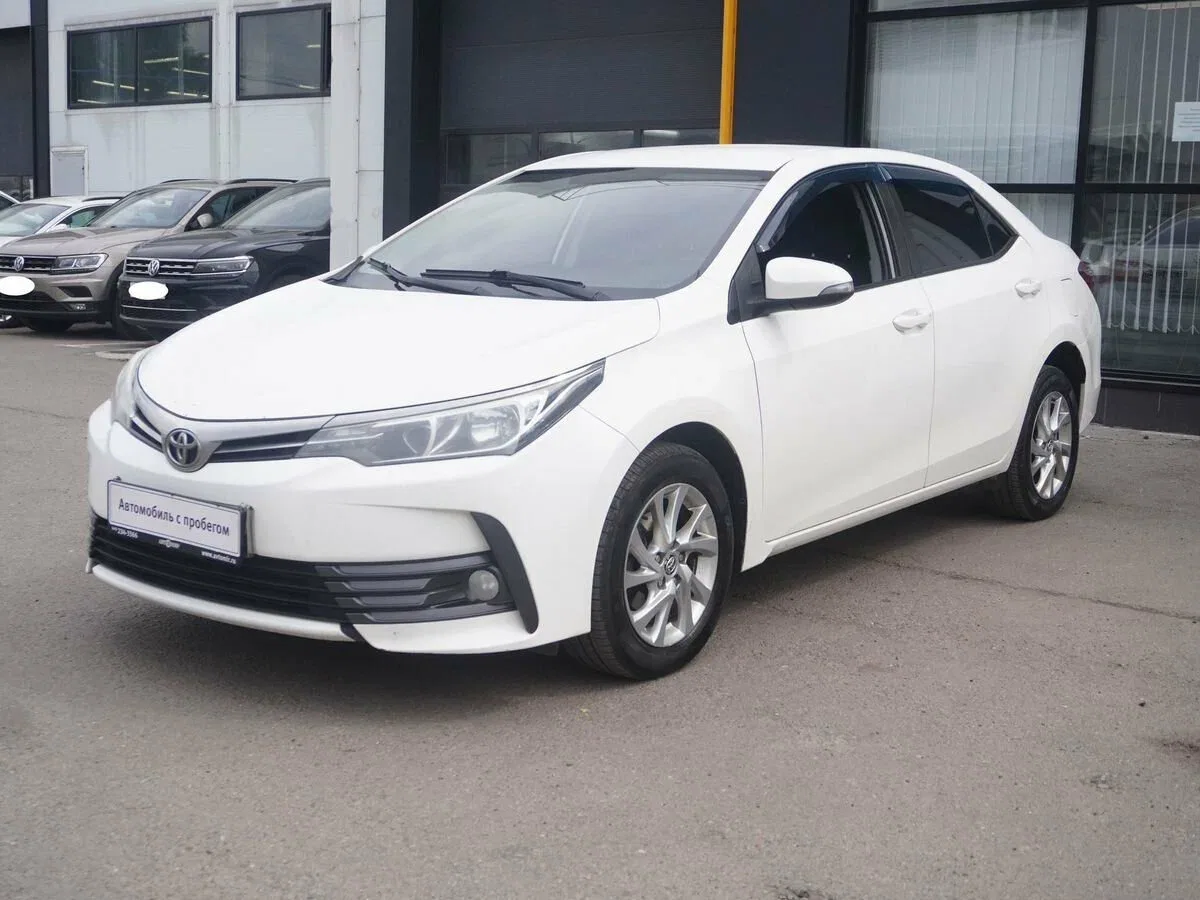Toyota Corolla XI (E160, E170, E180) Рестайлинг 1