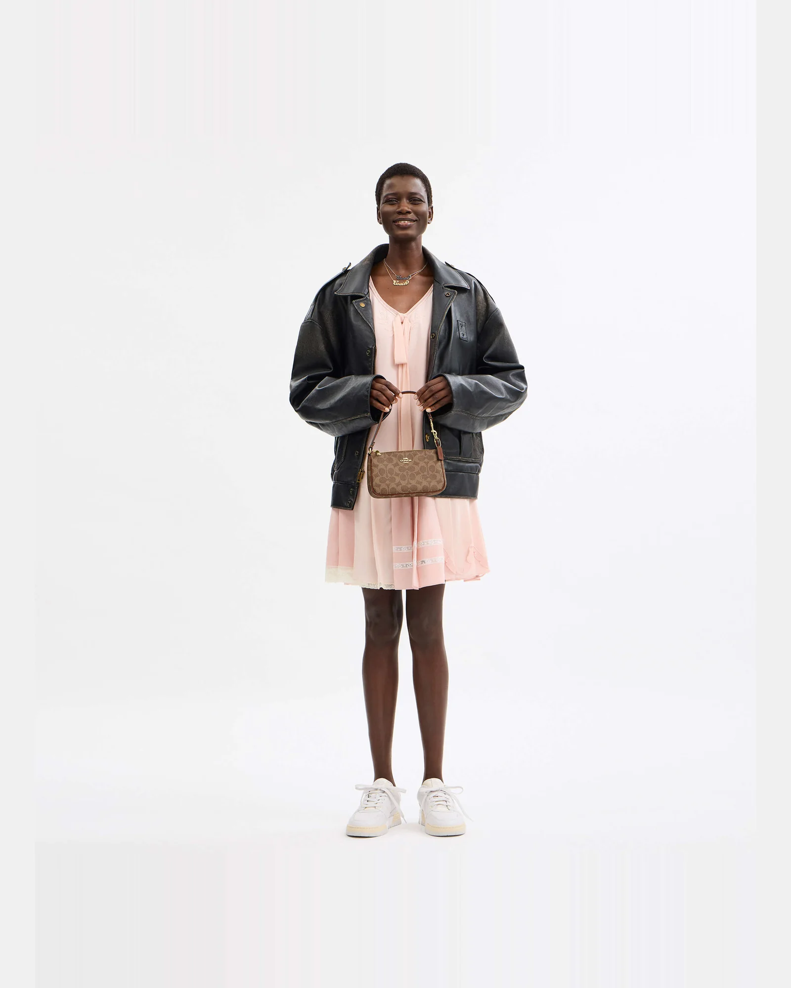 Сумка через плечо Coach Nolita 19 Signature Canvas — 7