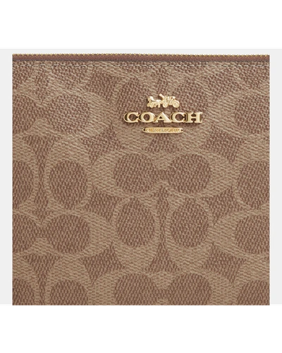 Клатч Coach на запястье
