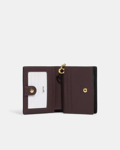 Кошелёк на кнопке Coach