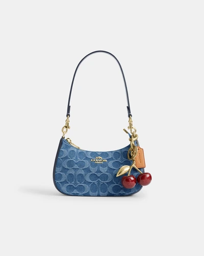 Мини-сумка кросс-боди Coach Teri из джинсовой ткани Signature