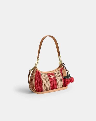 Сумка через плечо Coach Teri в полоску с подвеской