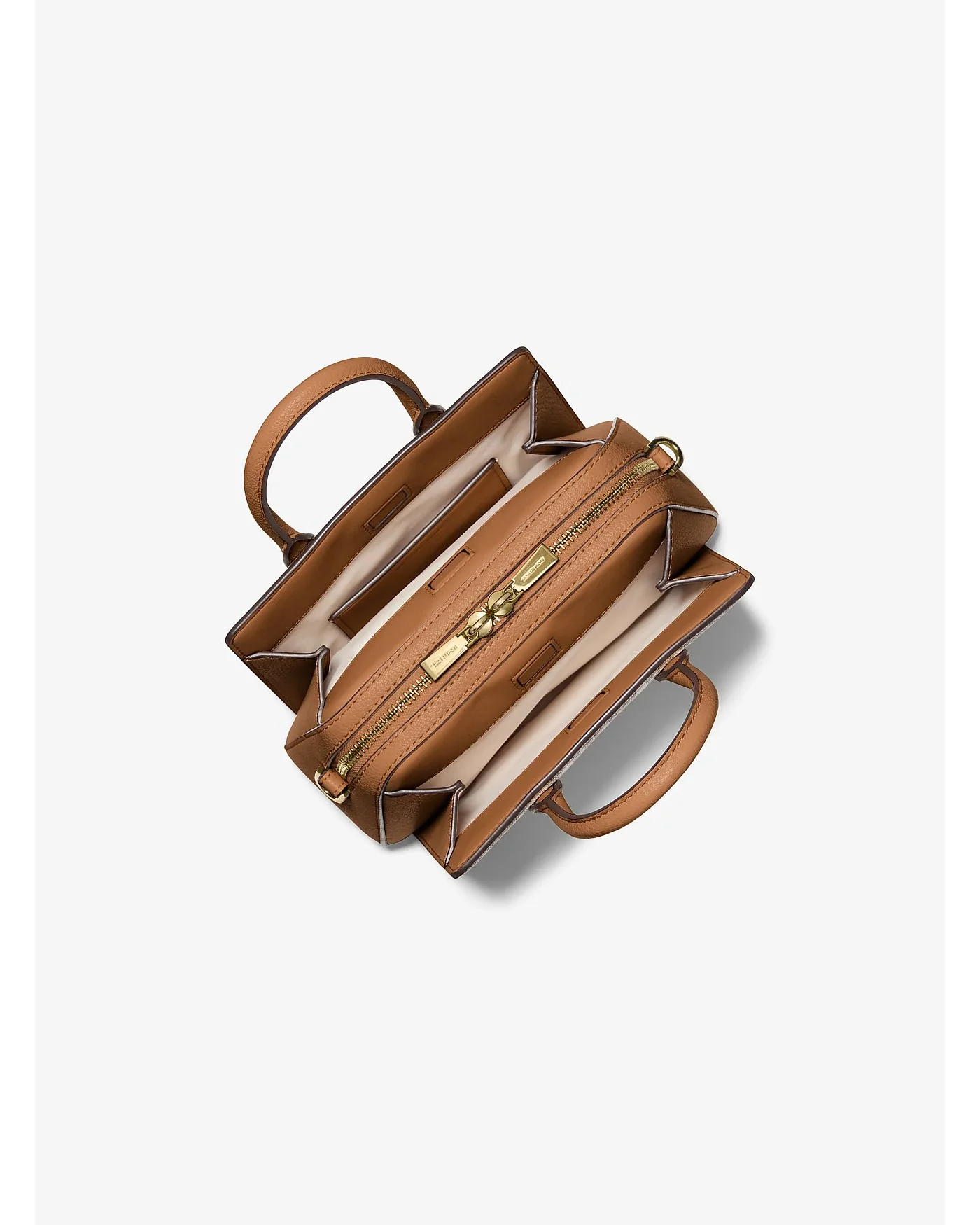 Открытая сумка Michael Kors Laila, видны внутренние отделения и коричневая подкладка.