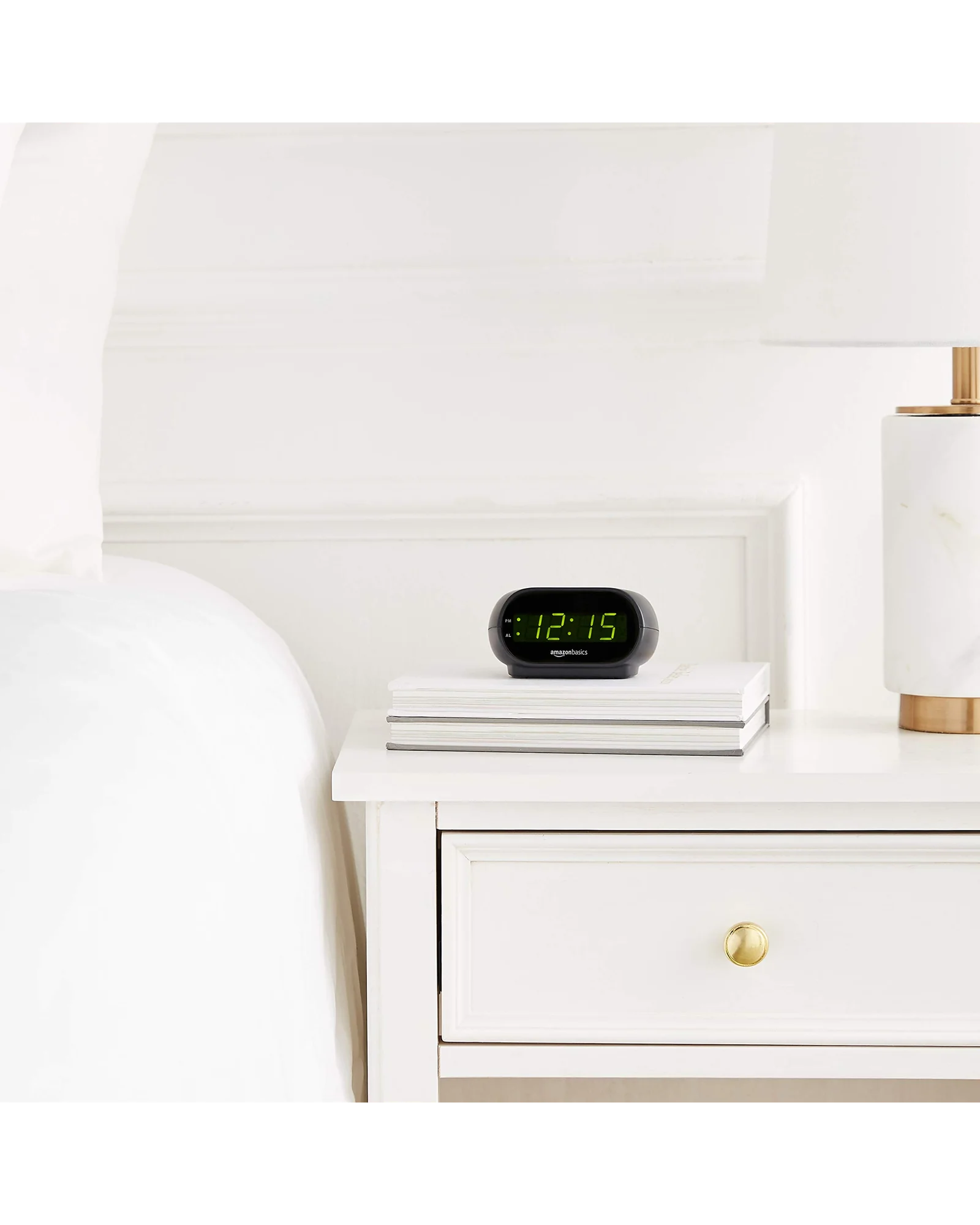 Amazon Basics Small Digital Oval Alarm Clock with LED Display, Nightlight, Snooze Function & Battery — 7