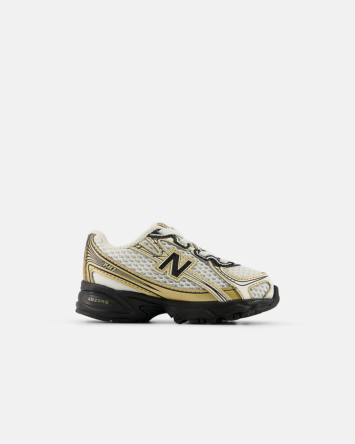 Бежевые кроссовки New Balance 740 Bungee Lace с сеткой, вид сбоку.
