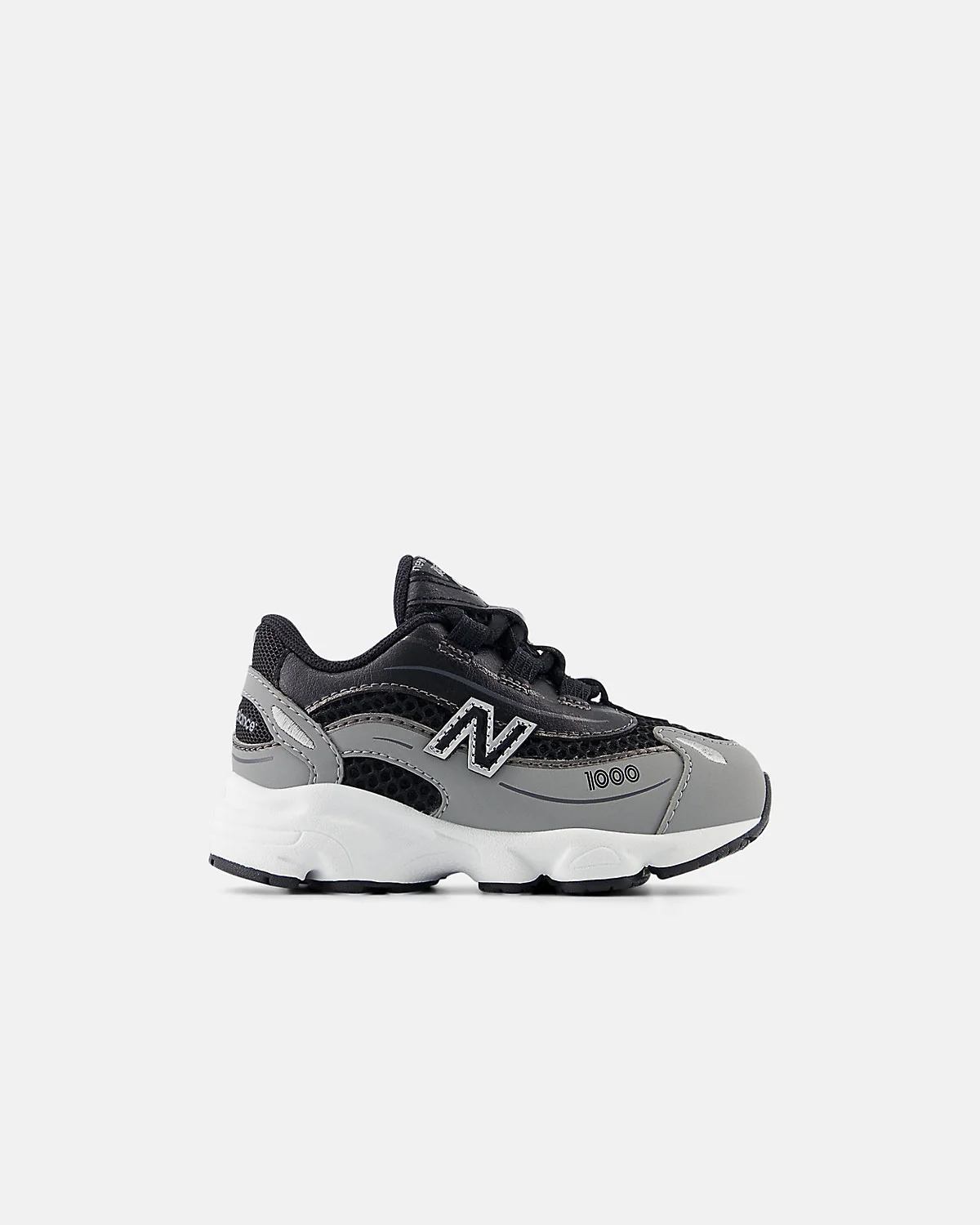 Кроссовки New Balance 1000 Bungee Lace бежевые с серебристыми вставками.
