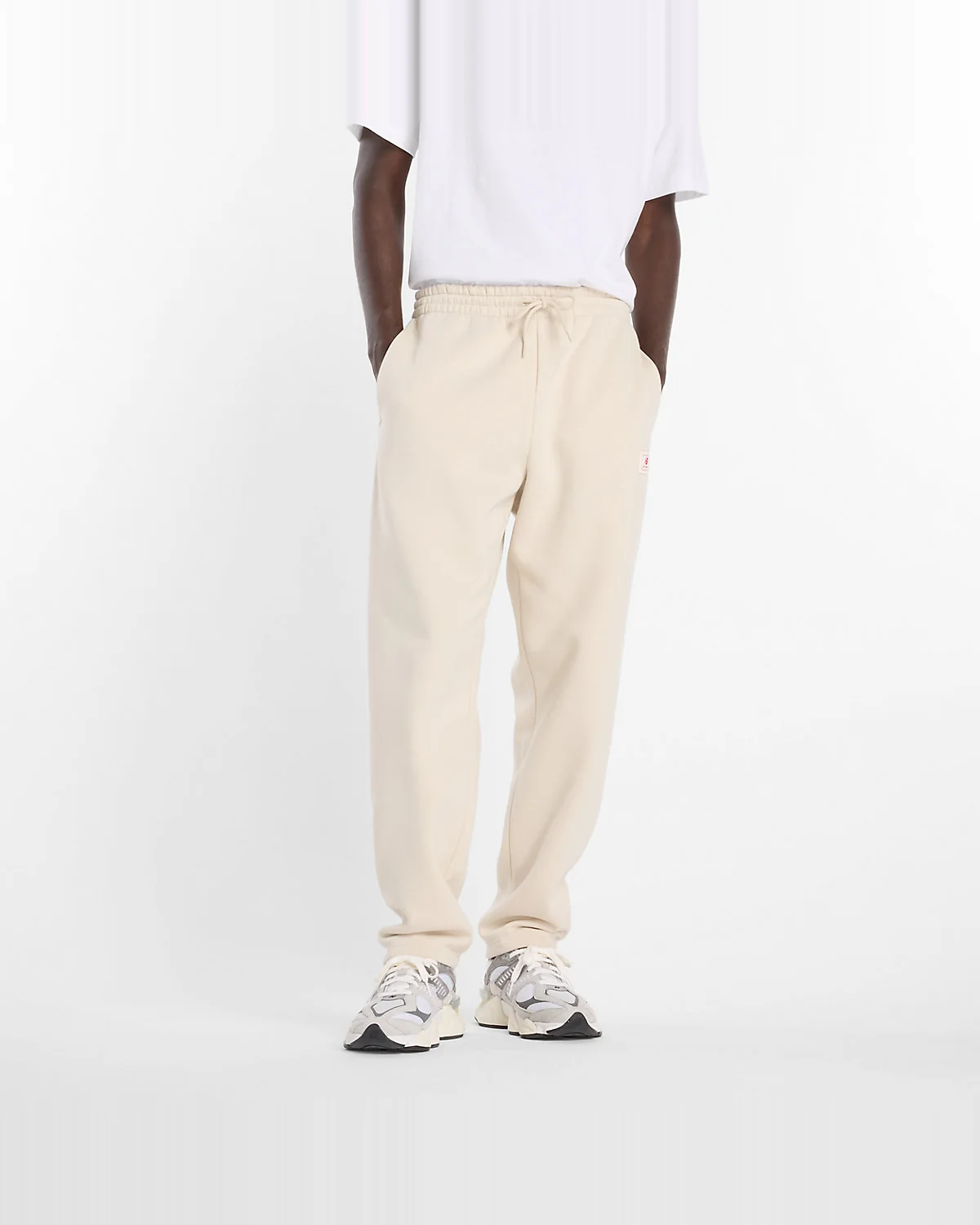 Брюки New Balance Woven Label — 2