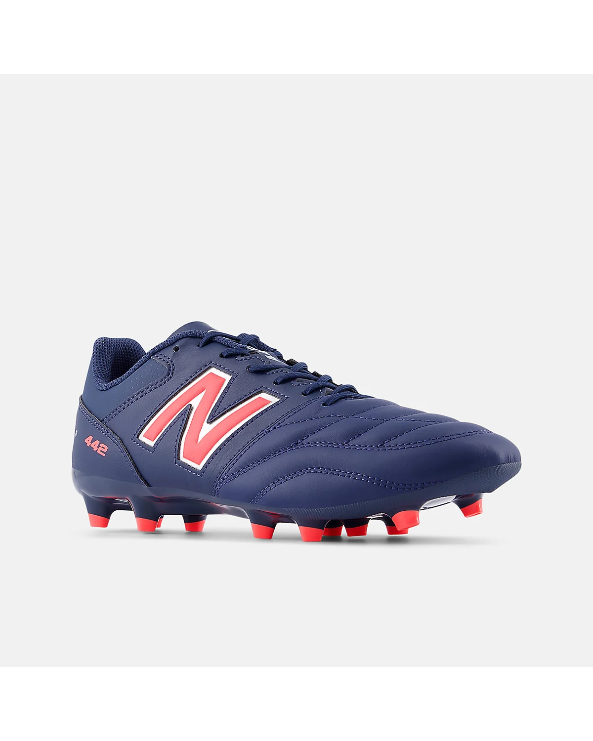 Синие бутсы New Balance 442 Team FG V2, вид сбоку с шипами