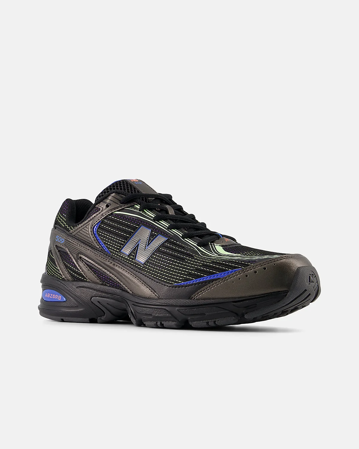 Многоцветные кроссовки New Balance 509 в боковом ракурсе с цветовым блоком.