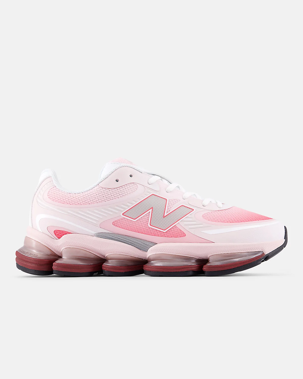Розово-белые кроссовки New Balance ABZORB 2000 с объёмной подошвой, вид сбоку