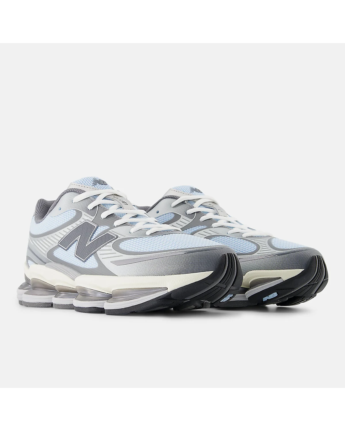 Голубые кроссовки New Balance Abzorb 2000, вид изнутри, видна многослойная конструкция.