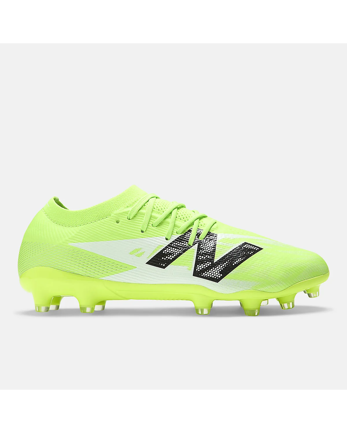 Неоново-зелёные женские футбольные бутсы New Balance Furon, вид сбоку