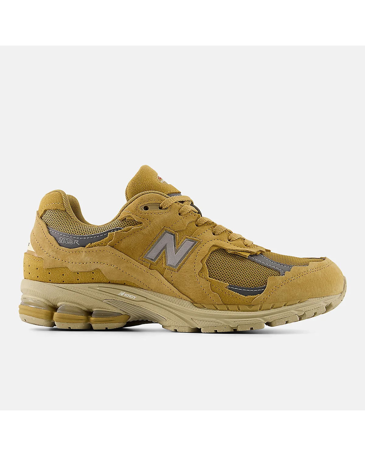Бежевые кроссовки New Balance 2002DX со вставками из сетки, вид сбоку.