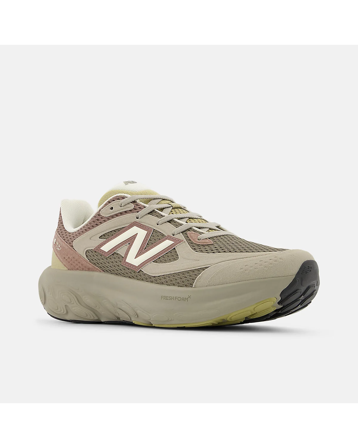 Кроссовки New Balance Fresh Foam Trainer с жёлто-зелёным акцентом на подошве.