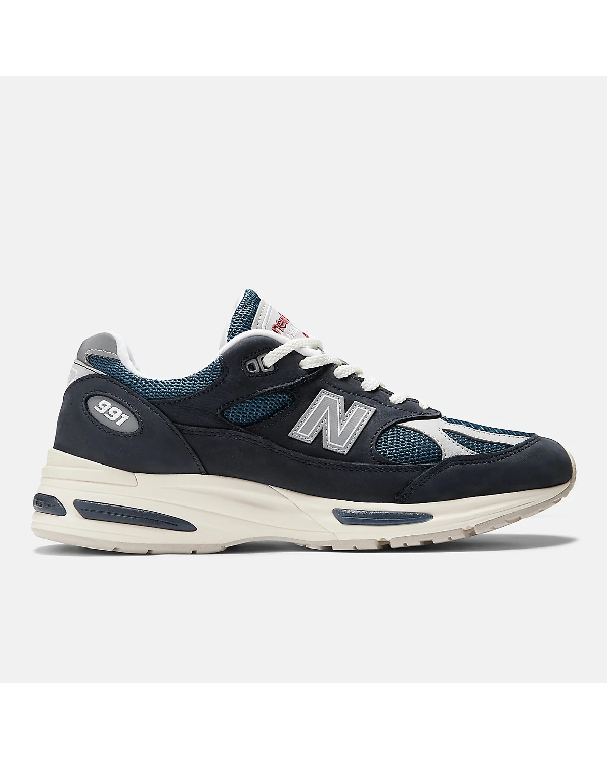 Кроссовки New Balance Made in UK 991v2 в тёмно-синем, бирюзовом и сером, вид сбоку.