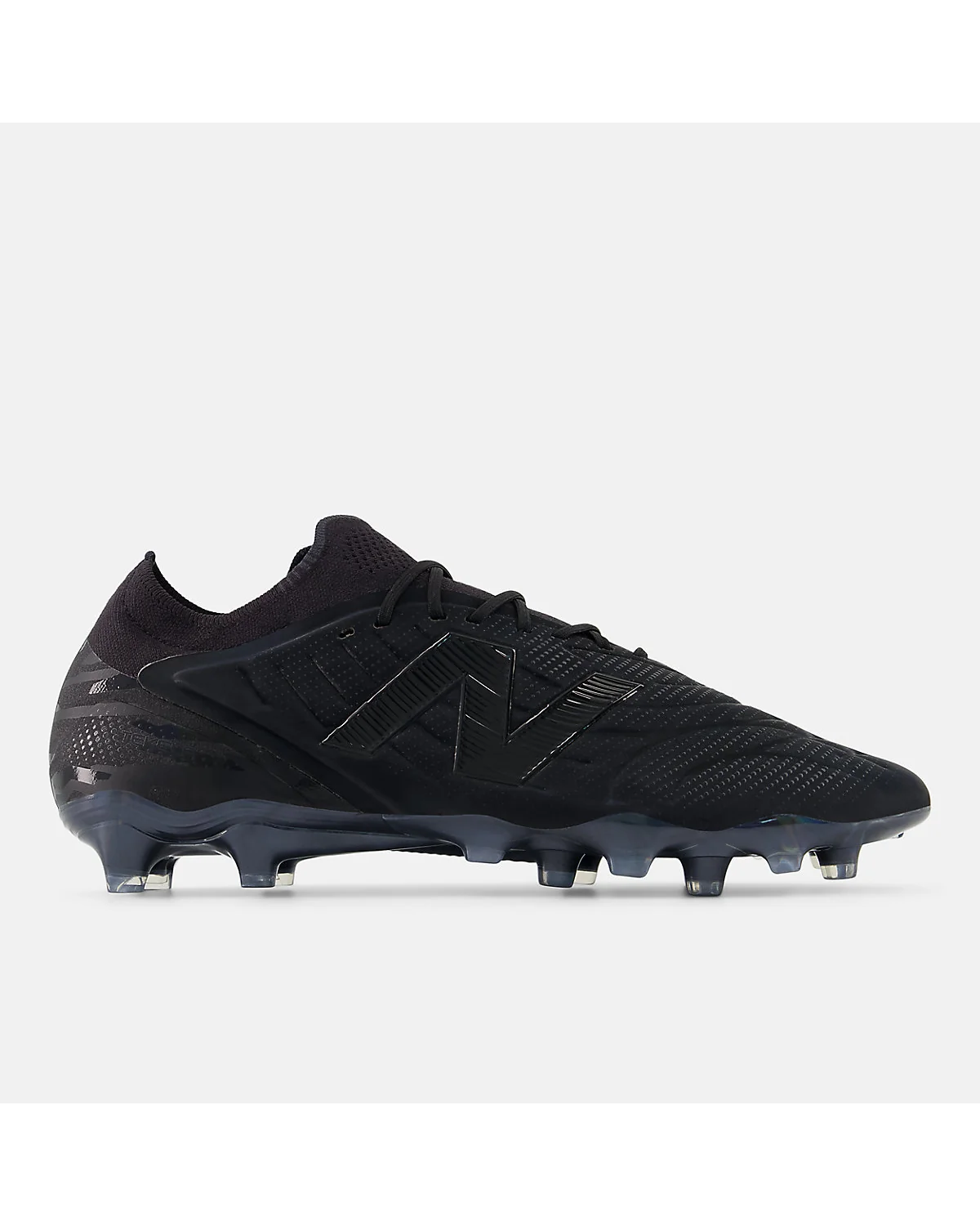 Чёрные футбольные бутсы New Balance Tekela Elite Low Laced FG v5
