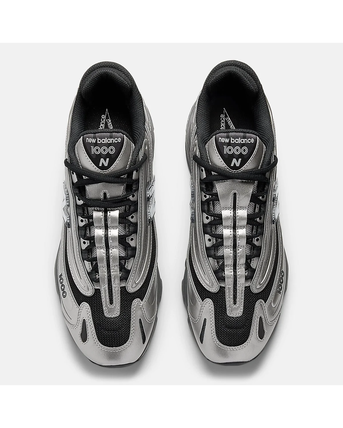Подошва объёмных кроссовок New Balance 1000 с видимой конструкцией, вид снизу.