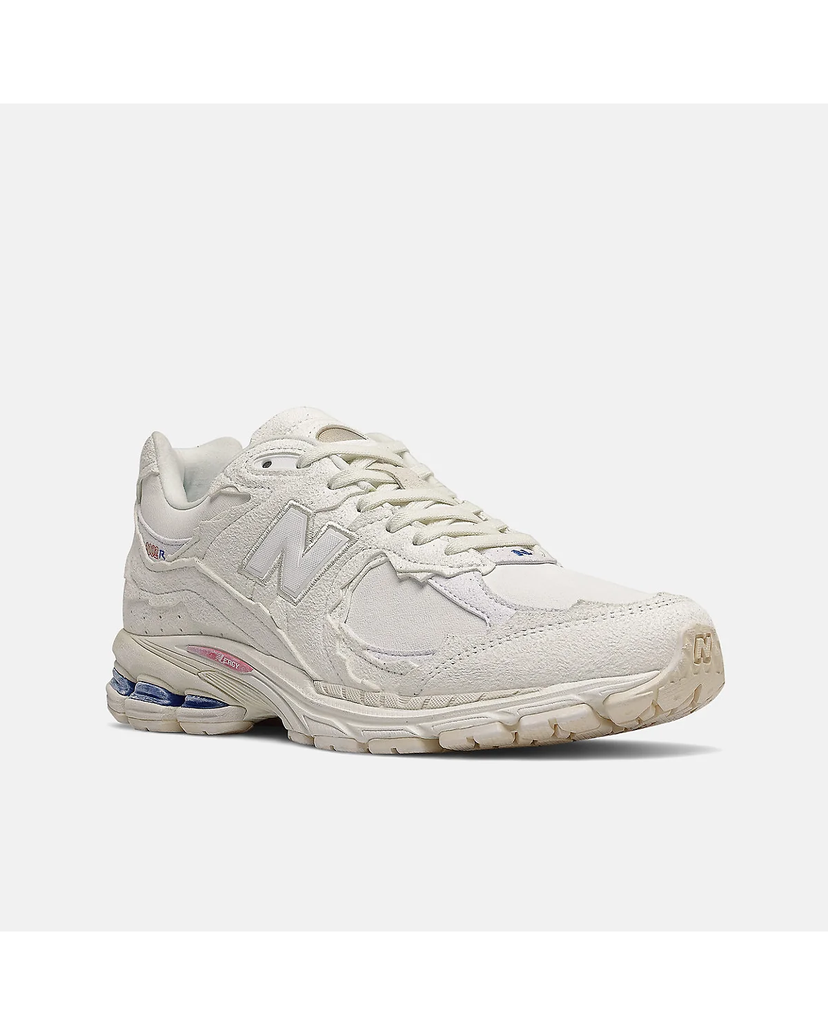 Кроссовки New Balance M2002RV1 бежевые с замшевой фактурой, вид сбоку