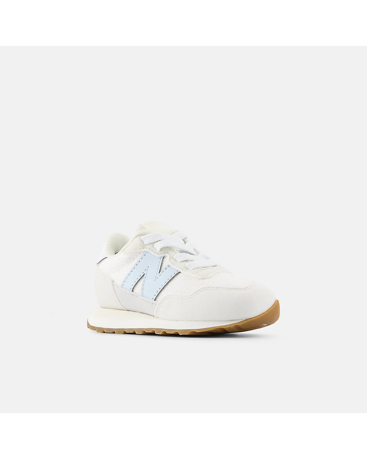 Детские кроссовки New Balance 237 светлые с эластичной фиксацией, вид сбоку