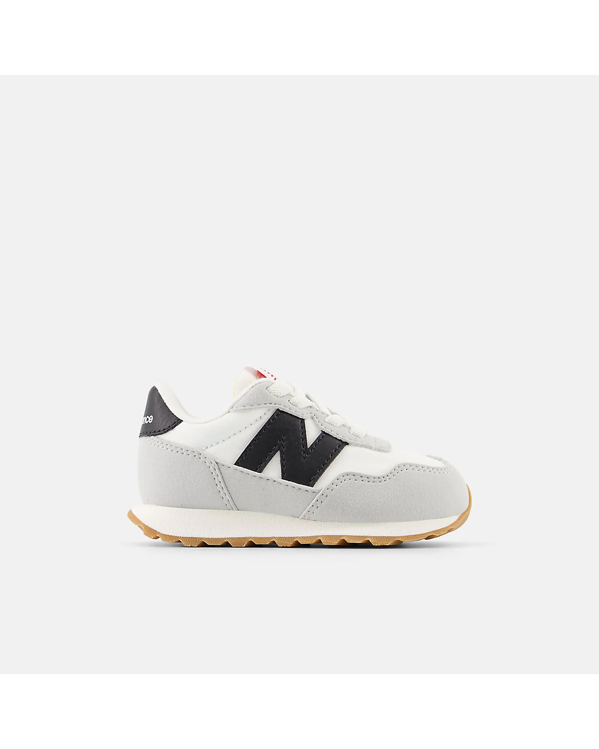 Кроссовки New Balance 237 Bungee белый с чёрным логотипом, вид сбоку