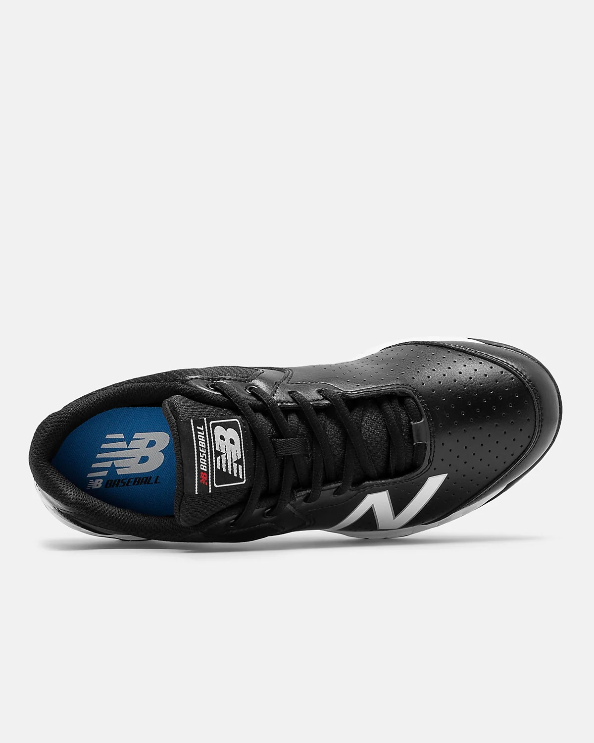 Крупный план материала New Balance 950v3: чёрная сетка, логотип и подошва.