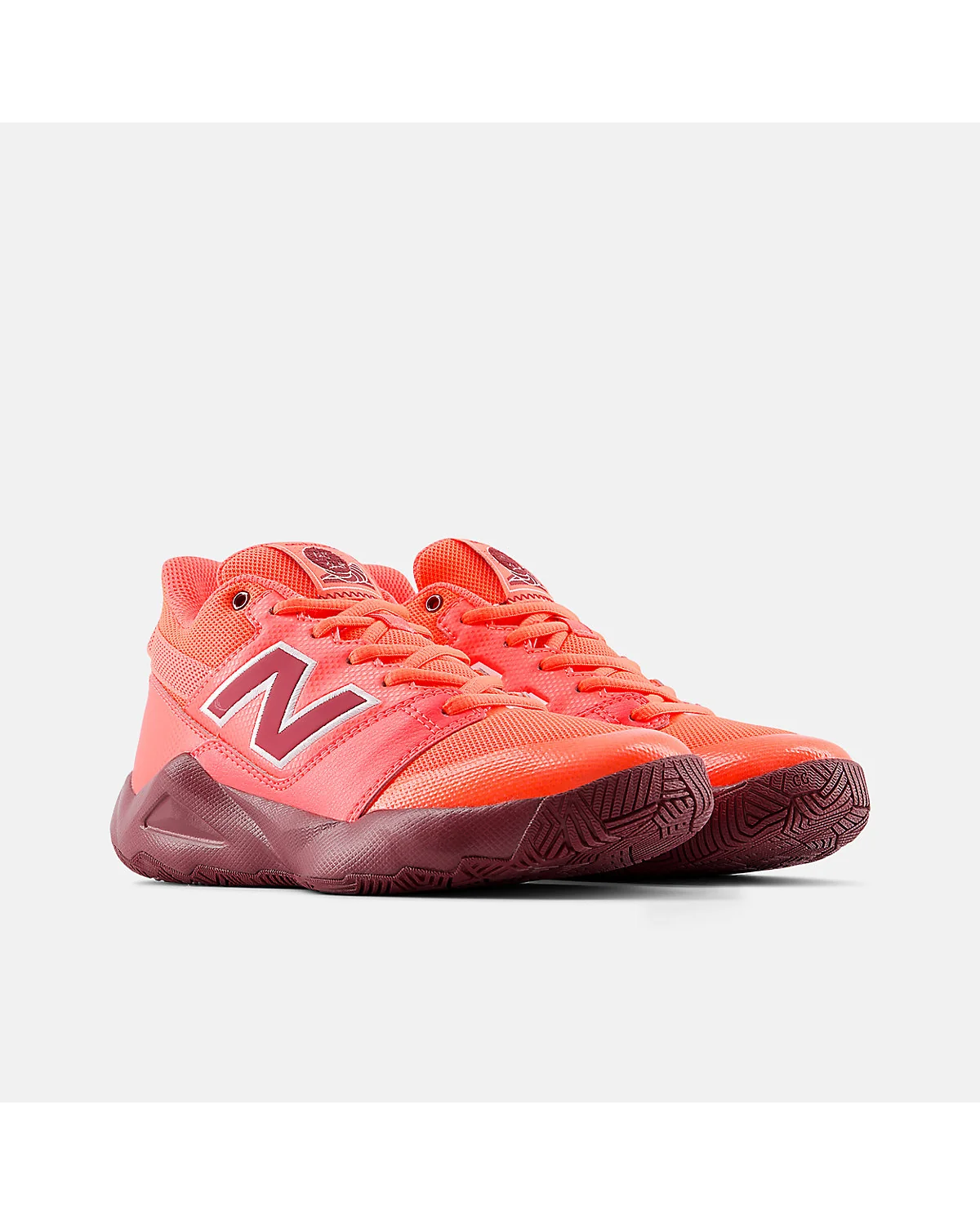 Детские кроссовки New Balance Coco CG2, вид спереди с двумя парами