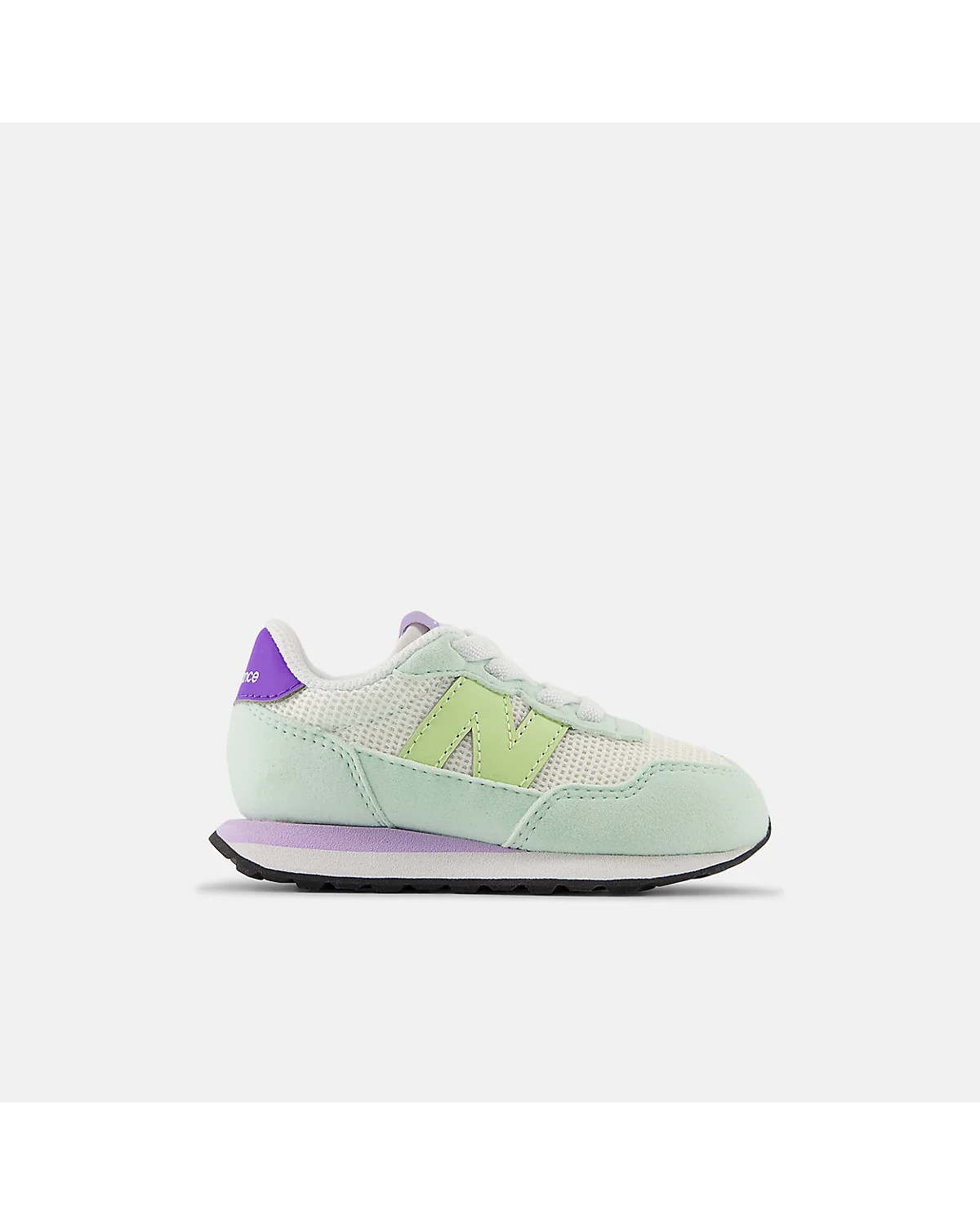 Светло-зелёные детские кроссовки New Balance 237 с жёлто-зелёным акцентом, вид сбоку