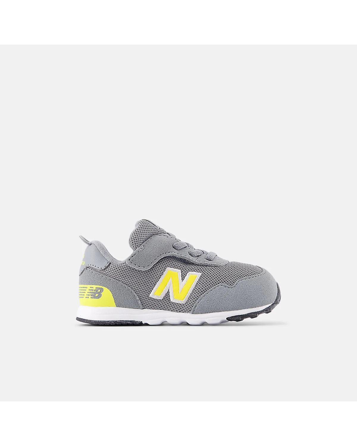 Серые детские кроссовки New Balance 515 с жёлтым логотипом, вид сбоку.
