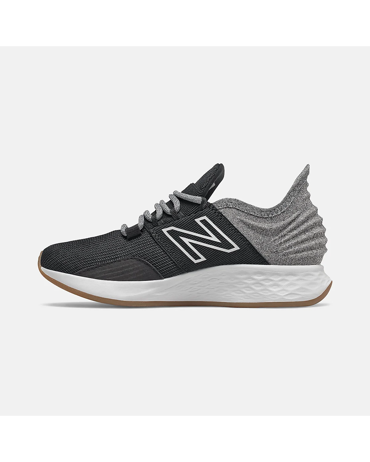 Подошва детских кроссовок New Balance ROAV с коричневым накладом и белым мидсолем
