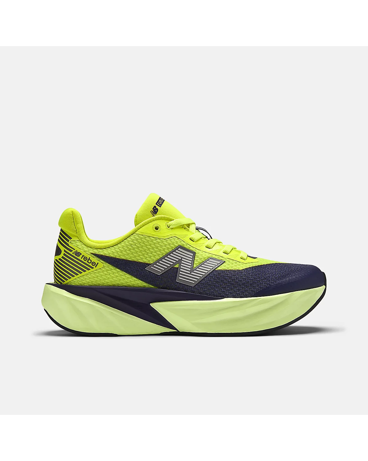 Ярко-жёлтые кроссовки New Balance FuelCell Rebel с тёмным основанием, вид сбоку