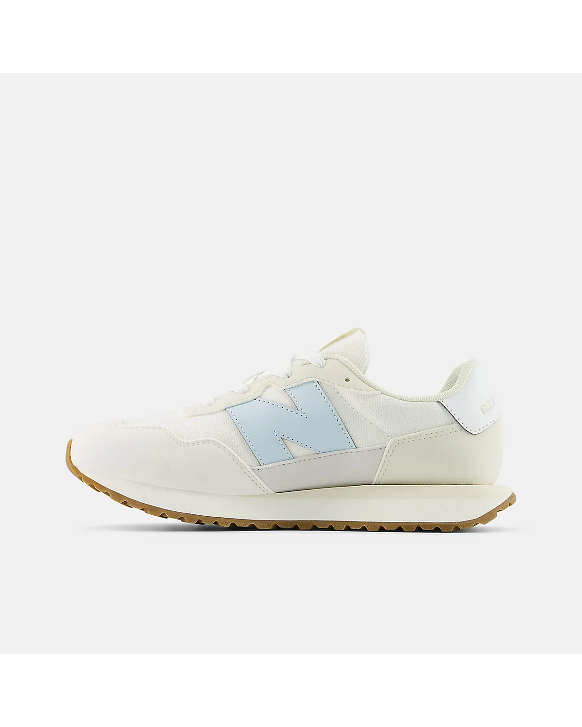 Детские кроссовки New Balance 237 кремовые, боковой профиль.