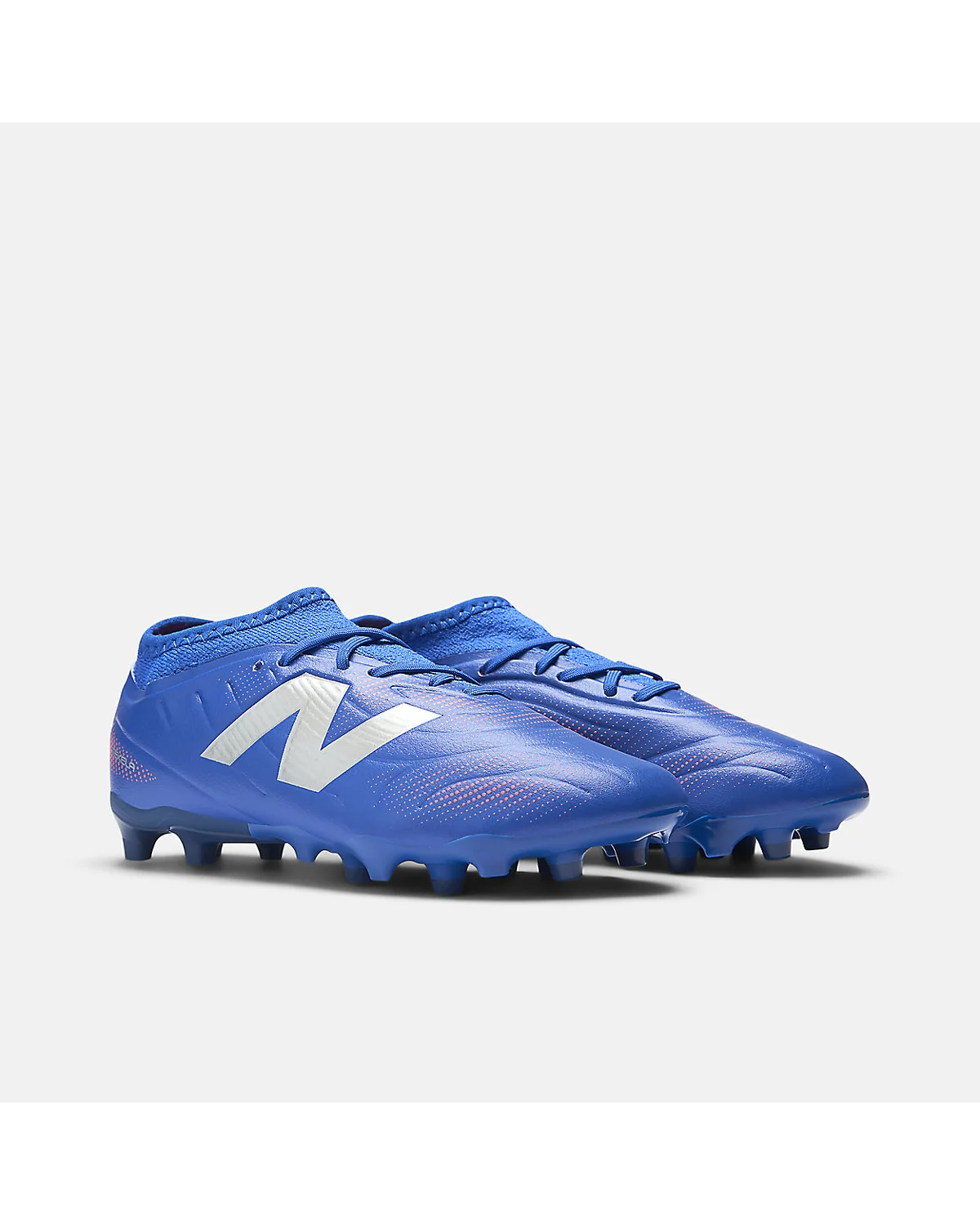 Подошва детских бутс New Balance Tekela синих с шипами для грунта