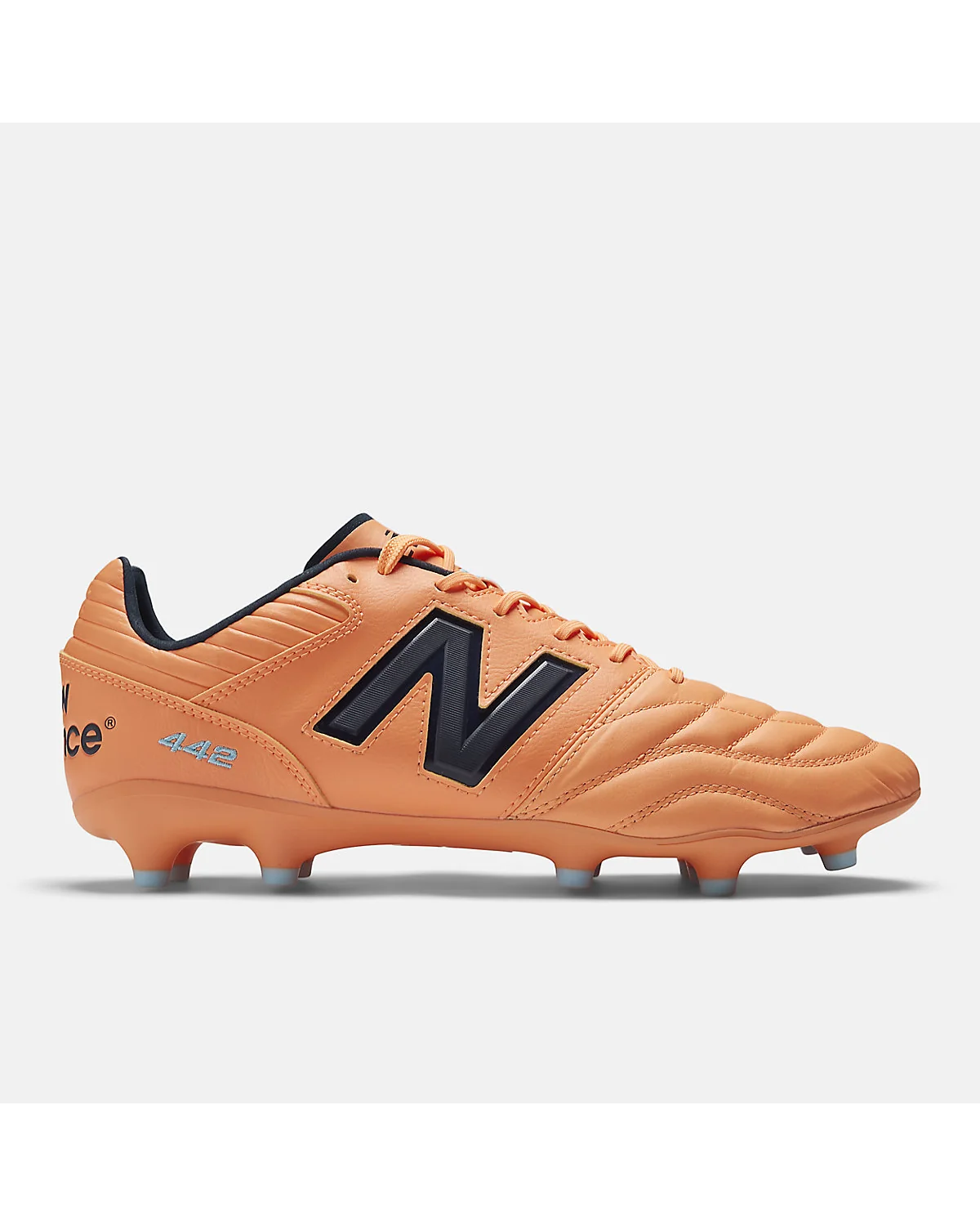Оранжевые футбольные бутсы New Balance 442 PRO FG V2, вид сбоку