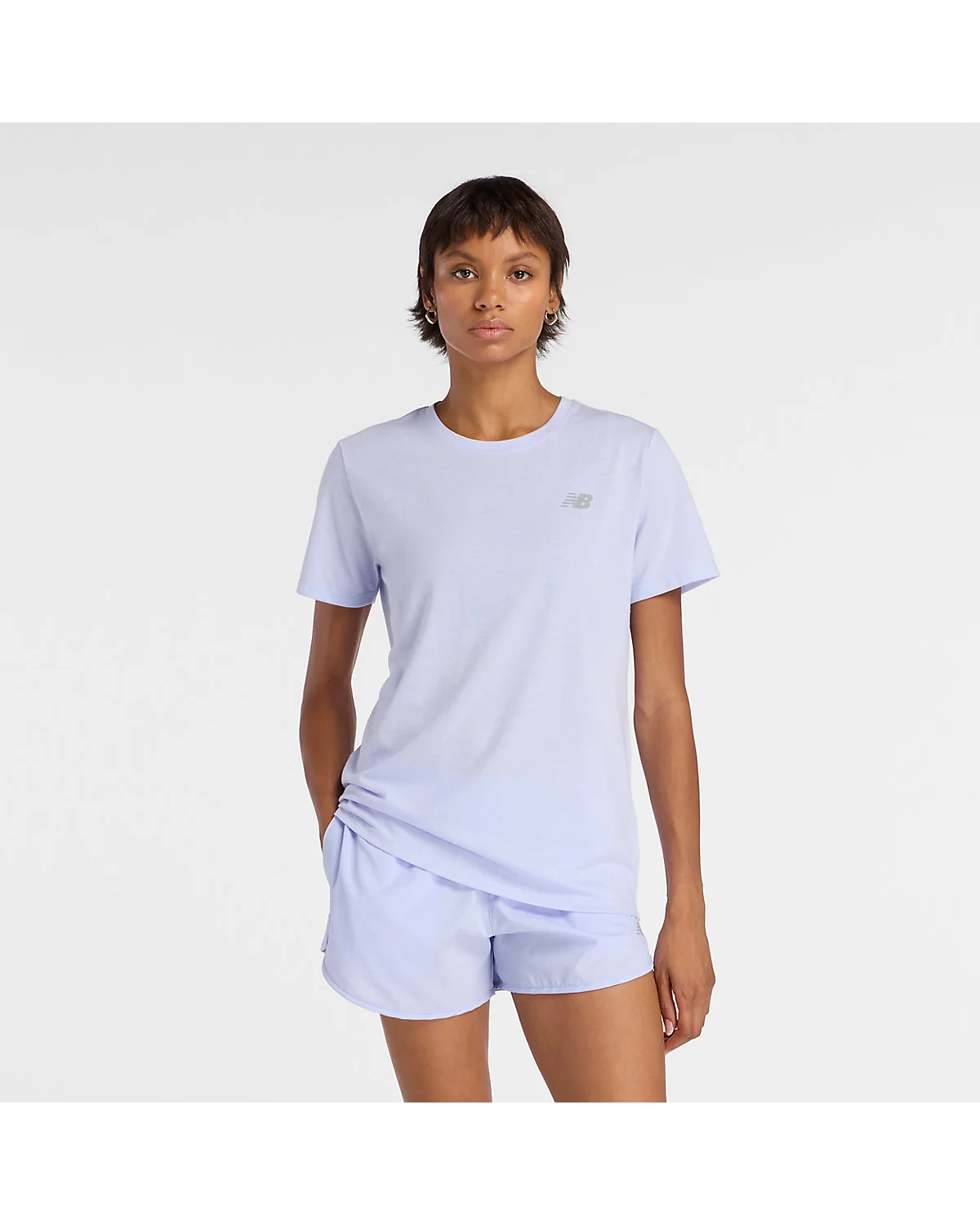 Голубая футболка New Balance Sport Essentials Heathertech, вид спереди.
