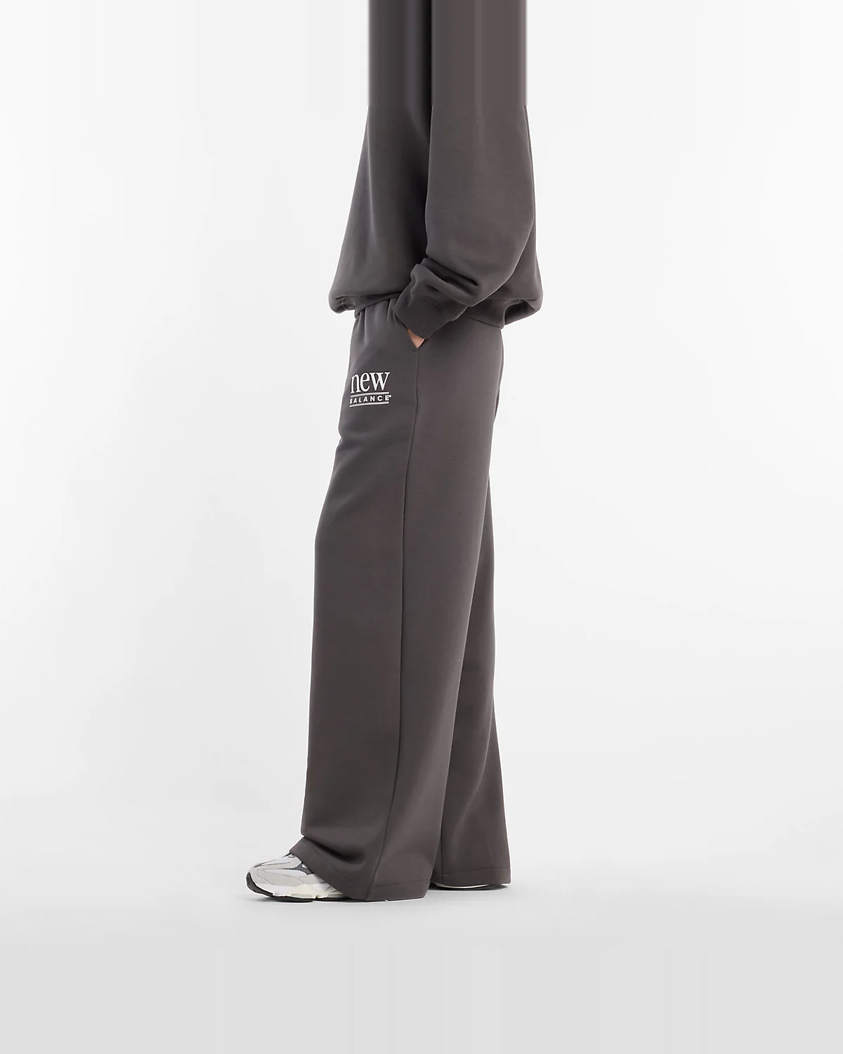 Брюки New Balance Reimagined Fleece черные — 5