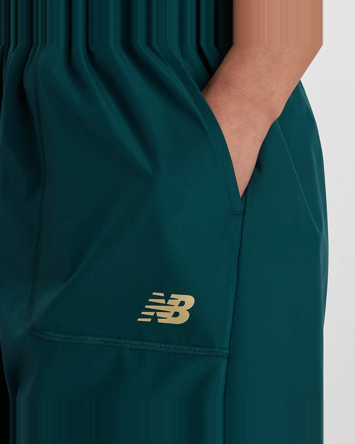 Женские брюки New Balance Trackside Woven — 6