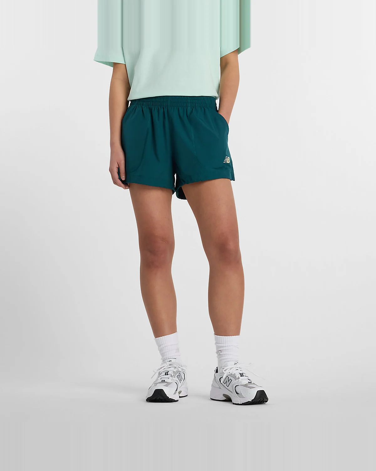 Женские шорты New Balance Trackside Woven — 1