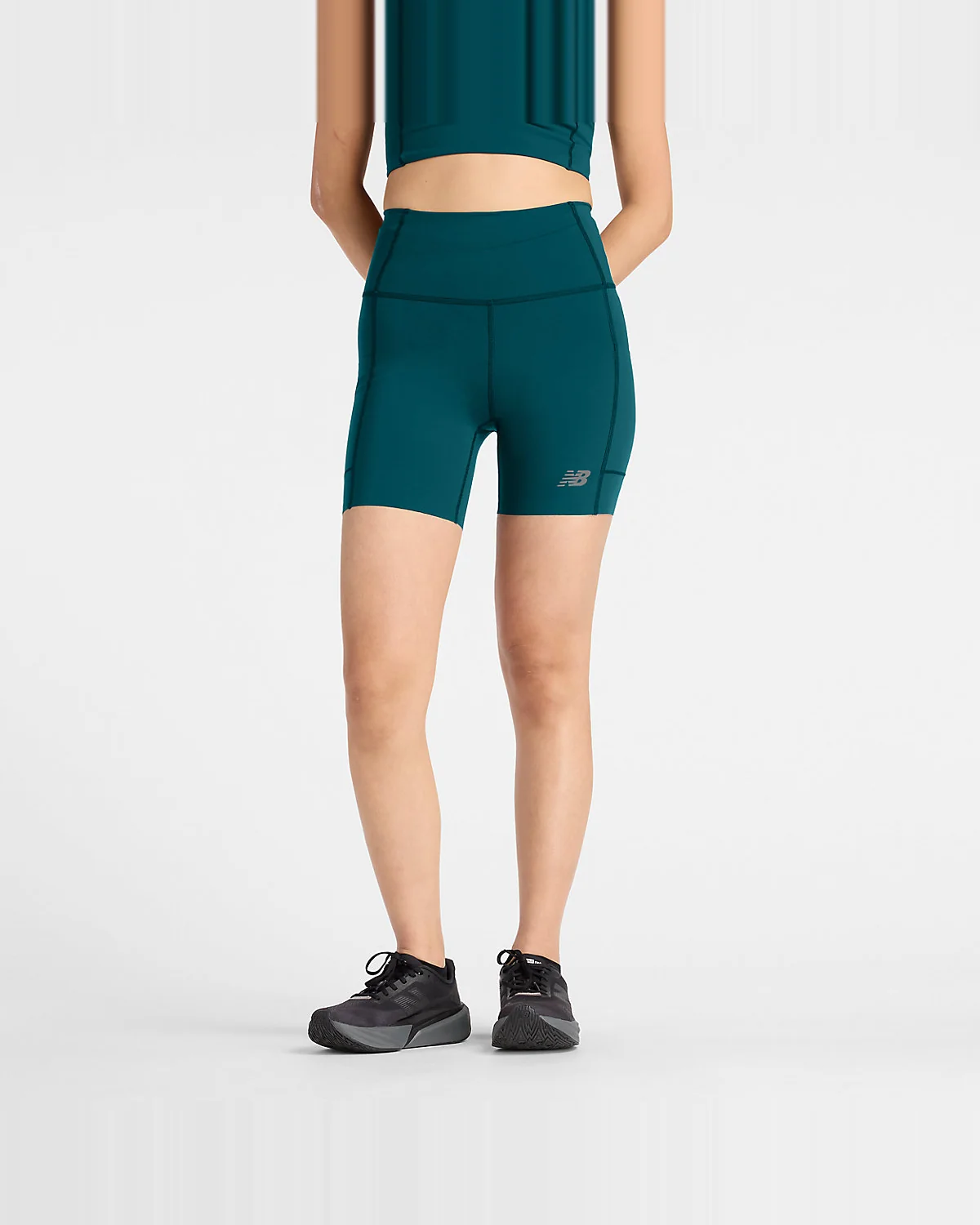 Женские шорты New Balance RC Elite Storage Short 6" — 1