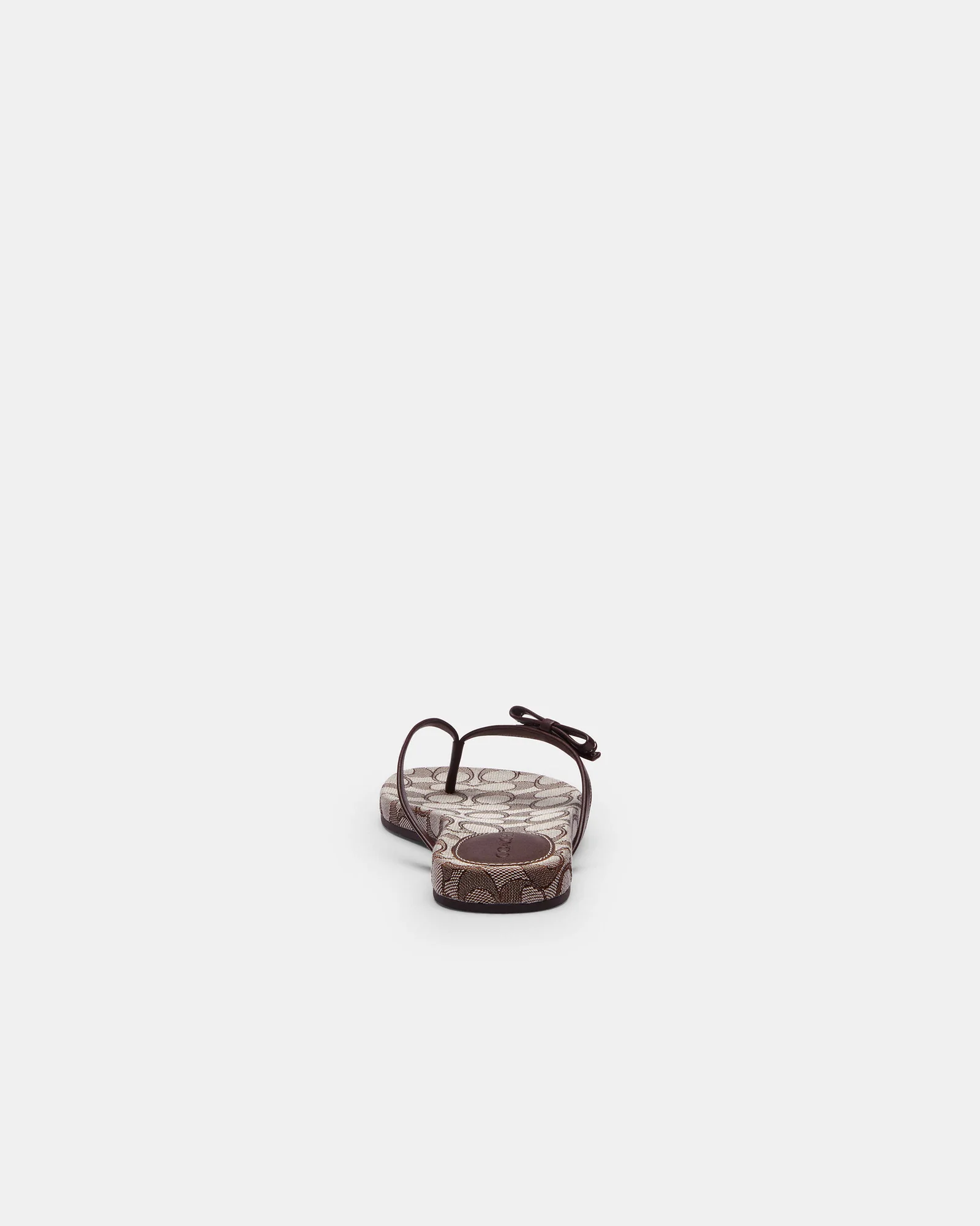 Шлёпанцы Coach с бантом из фирменного жаккарда — 6