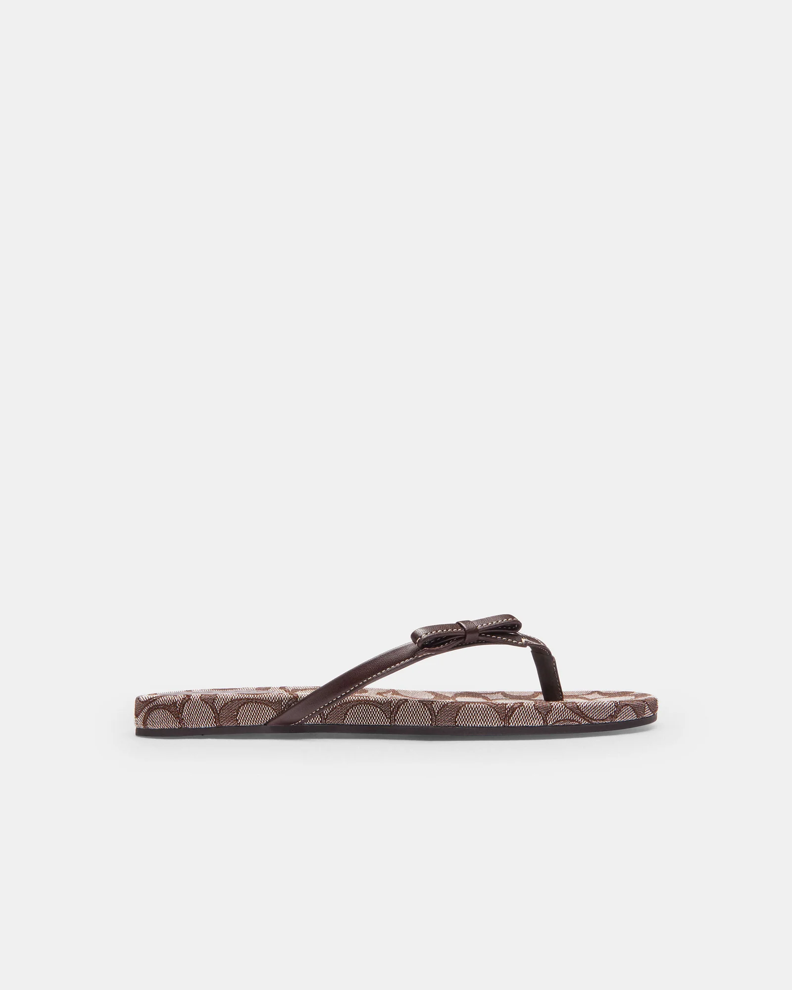 Шлёпанцы Coach с бантом из фирменного жаккарда — 7