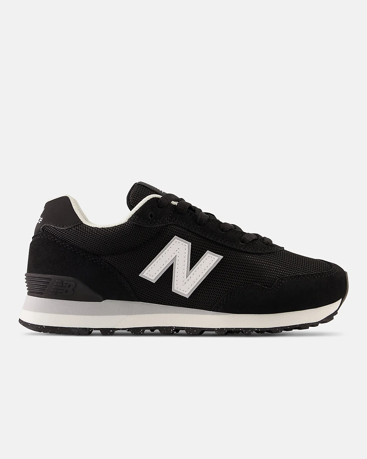 Тёмно-синие кроссовки New Balance 515 из кожи с белым логотипом, вид сбоку.
