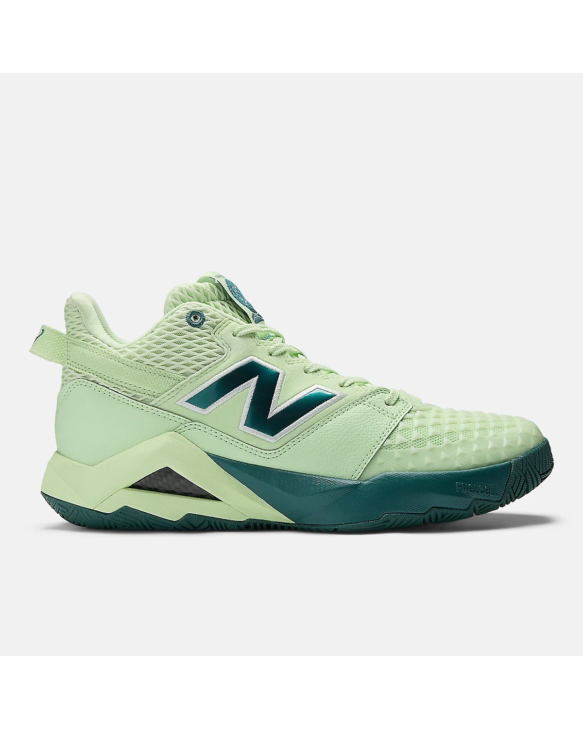 Зелёные кроссовки New Balance Coco CG2 с тёмно-синими деталями, вид сбоку.