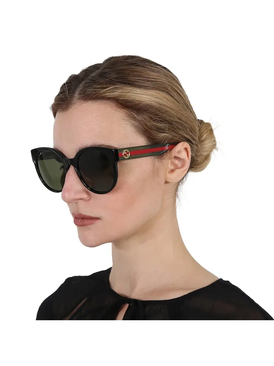 Женские круглые солнцезащитные очки Gucci Green GG0035SN 002 54 — изображение 2 из 5, черный/зеленый