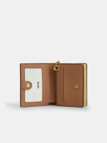Кожаный кошелёк на кнопке Coach с брелоком