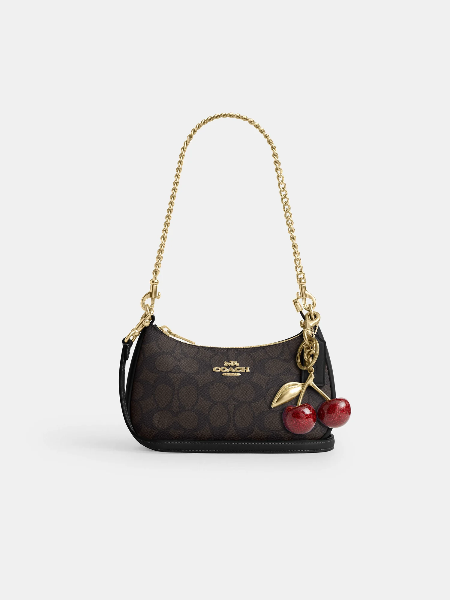 Мини-сумка Coach Teri с фирменным принтом — 1